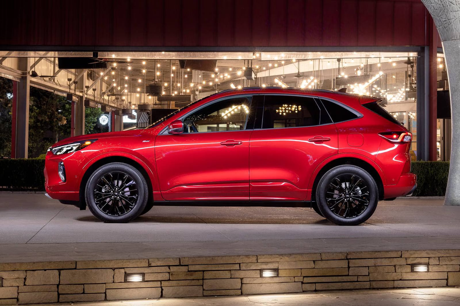 2026 Ford Escape parked at night time in front of a building